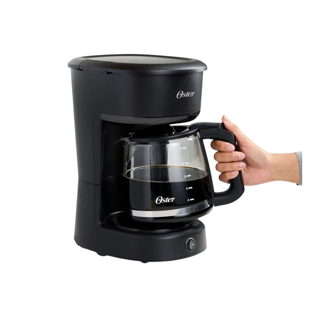 Cafetera de 12 Tazas Con Filtro Reutilizable Botón Luz Encendido y Apagado Función Pausa y Servir Ventanilla de Agua Negro Oster
